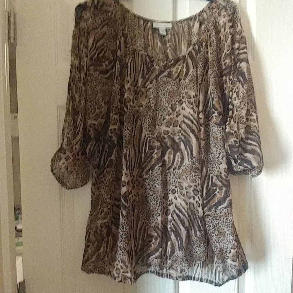 Sheer blouse with open sleeve